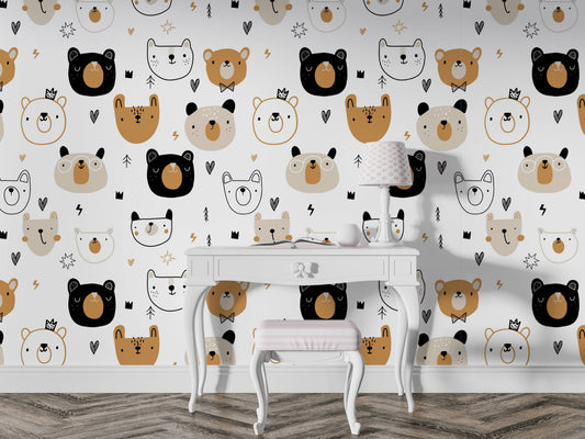 A white elegant study desk set against a cute repeating Nordic bear face wallpaper mural in a kids room.