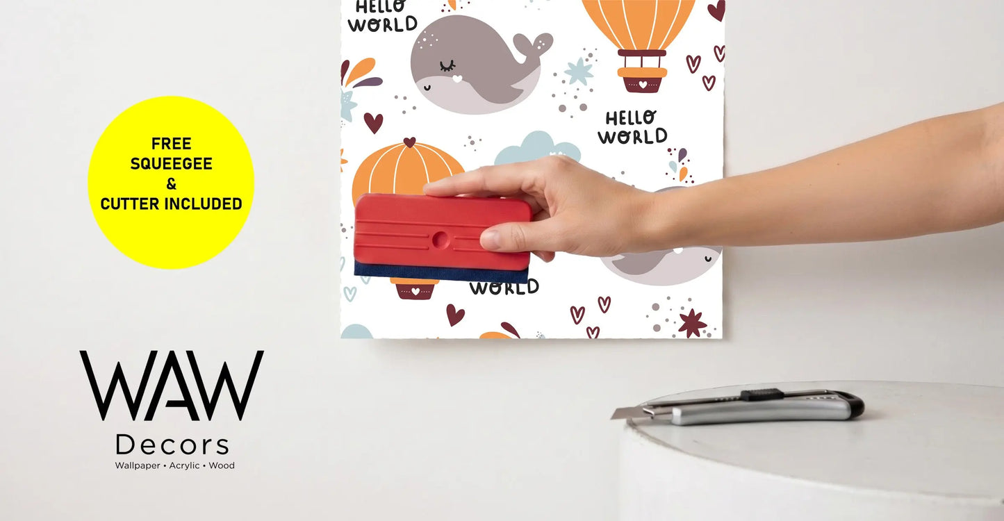 Applying the Hello World whale wallpaper with the free included squeegee and cutter tools