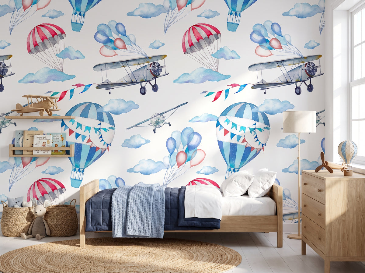 Airplane nursery wallpaper with vintage planes and hot air balloons above a crib