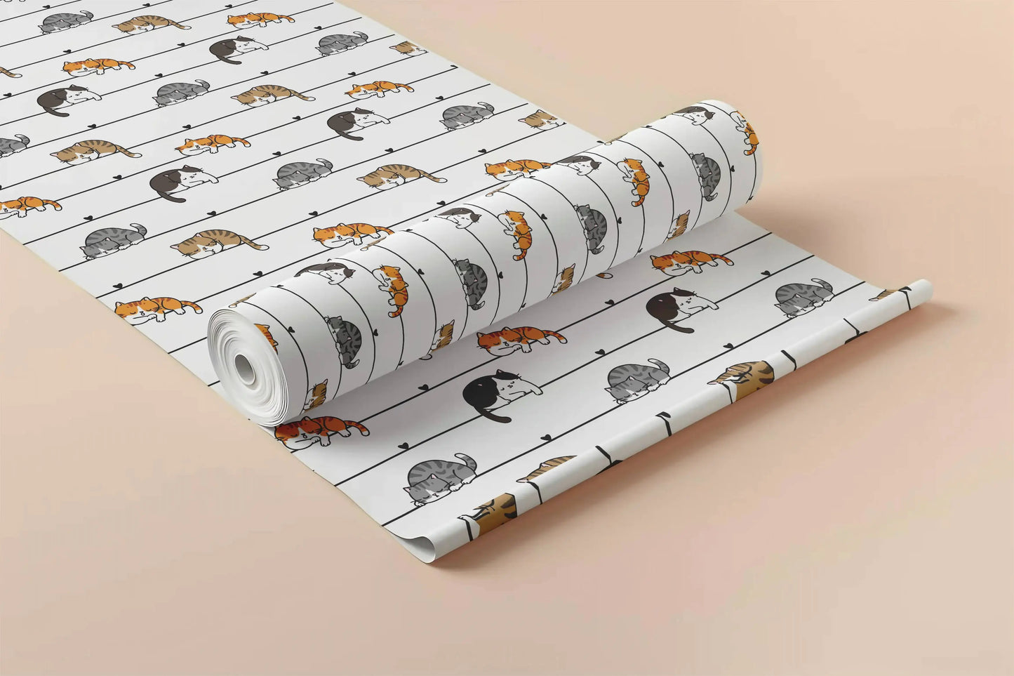 Close-up of a rolled cartoon cats peel and stick wallpaper panel