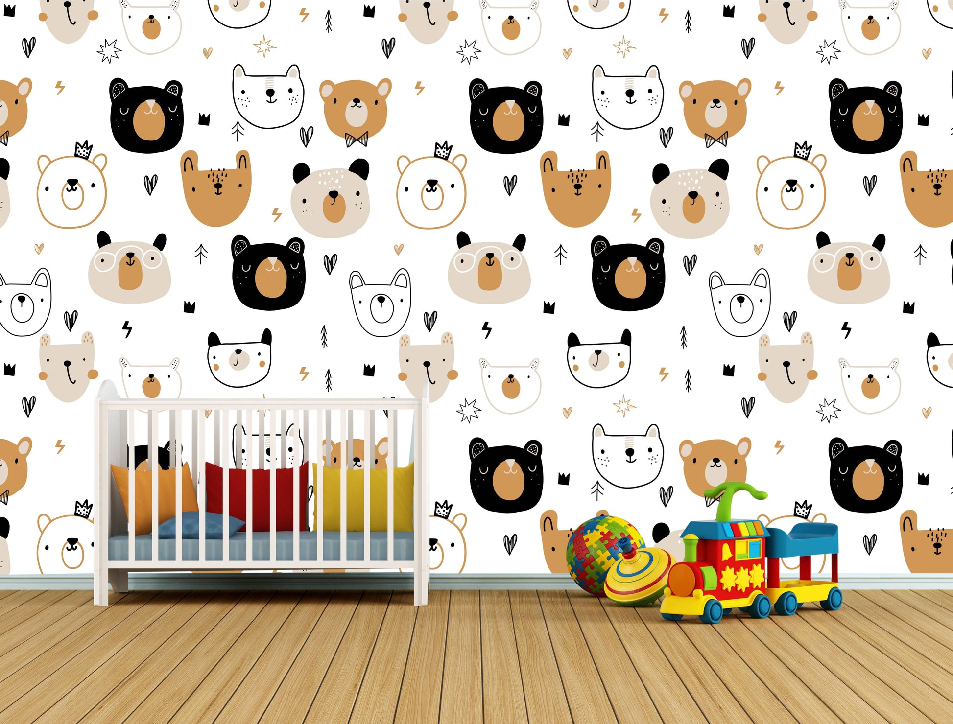 A cozy baby nursery setup featuring a white crib and colorful toys against a repeating neutral cartoon bear wallpaper.