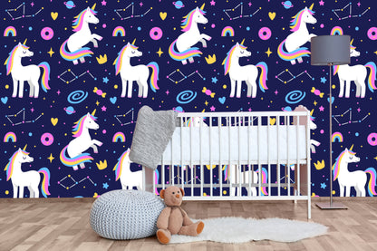  Galaxy unicorns nursery wallpaper behind a white crib with a gray floor lamp and teddy bear
