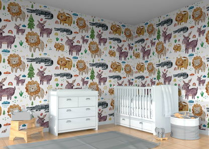 Safari animals nursery wallpaper wrapped around a room corner behind a white crib and dresser