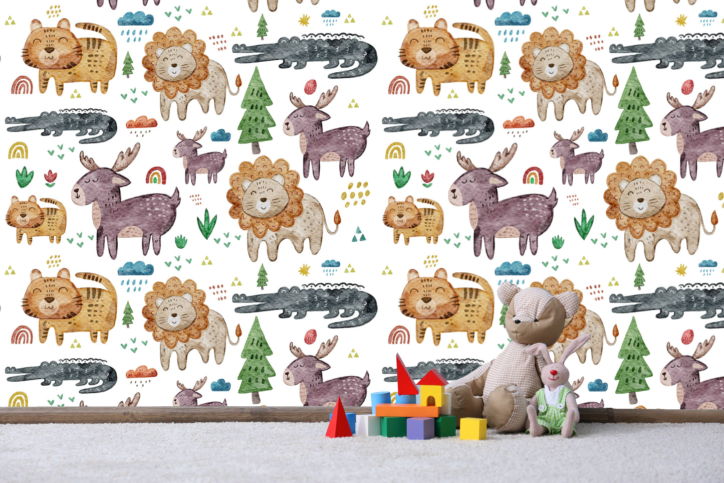 atercolor safari animals nursery wallpaper behind a stuffed bear and bunny toy with wooden building blocks