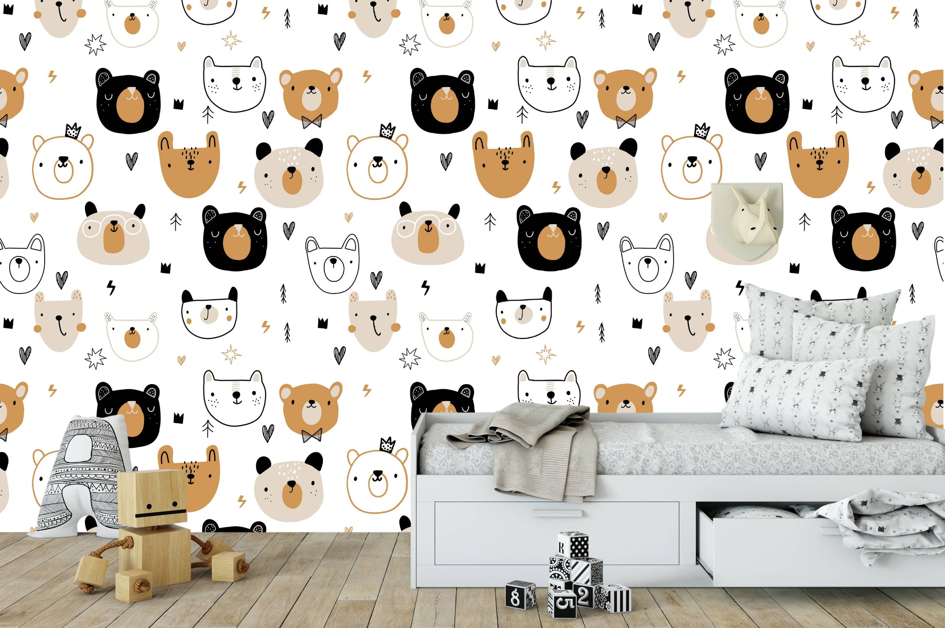 A bright minimalist children room with a sleek low bed and soft bedding placed in front of a playful bear pattern wall mural.