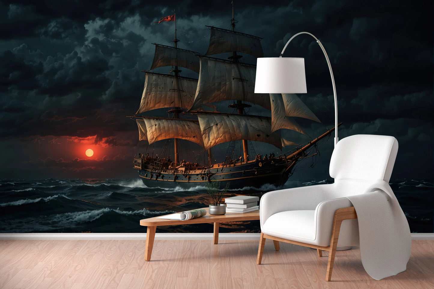 Vintage sailing ship wall mural with a dramatic sunset seascape, styled behind a white armchair and floor lamp