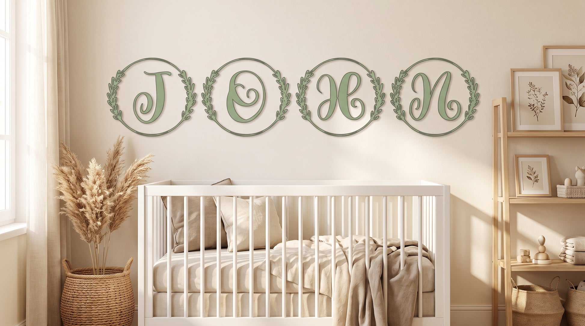 Custom wood monogram letter sign spelling "JOHN," each letter framed in a green wreath circle, above a nursery crib