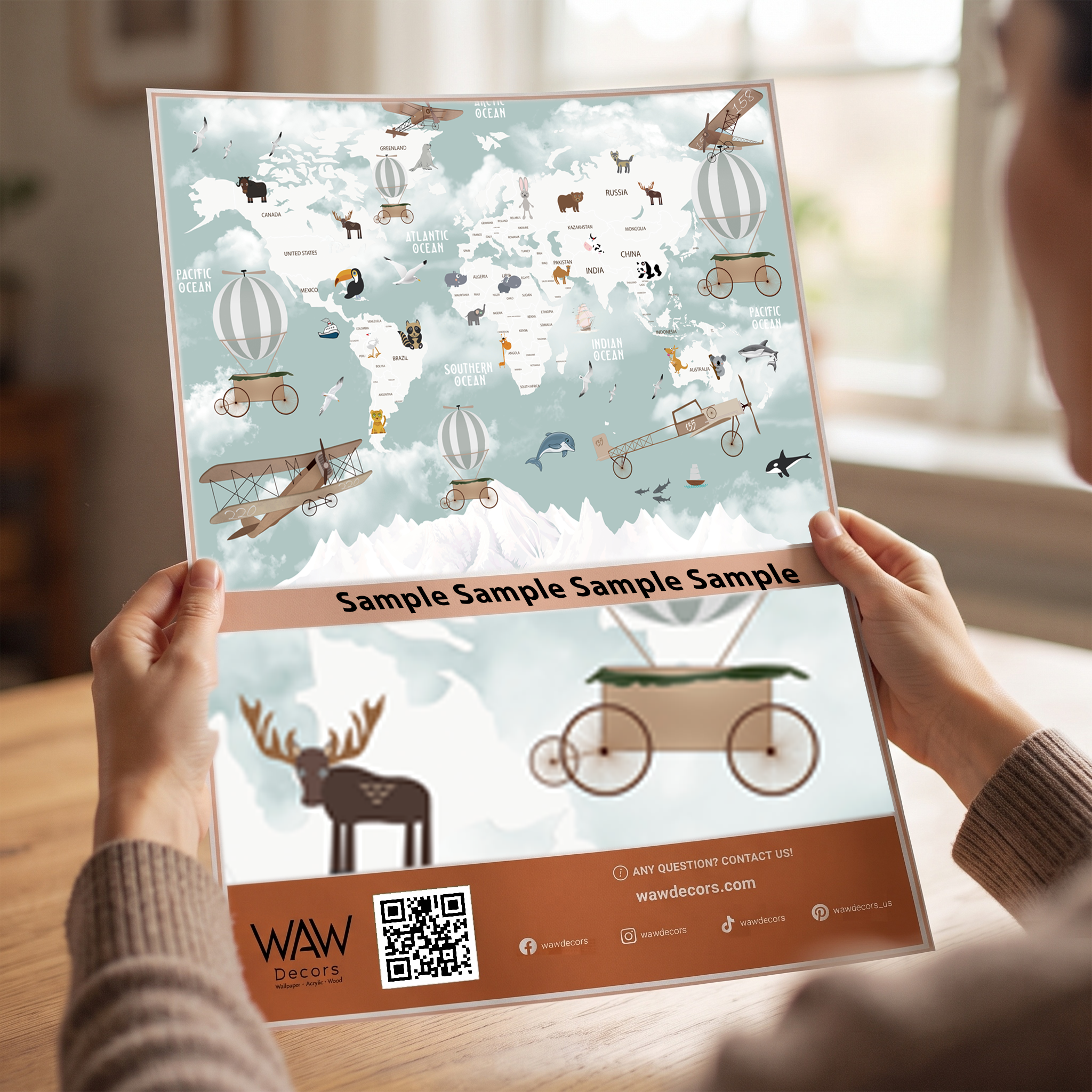 Close-up detail of the world explorer map wallpaper print showing continents and travel icons